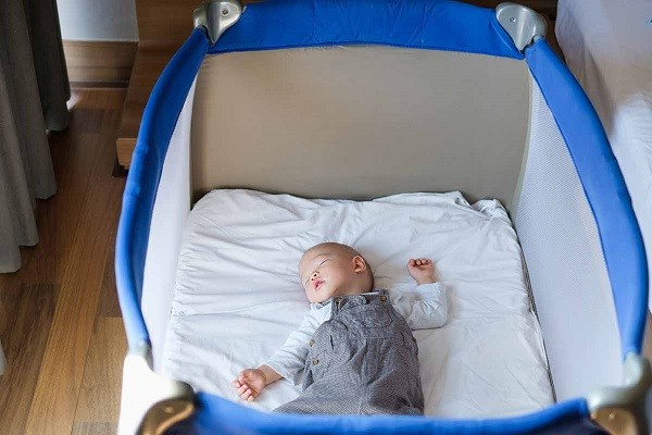 How can I make my Pack N Play more comfortable for my newborn