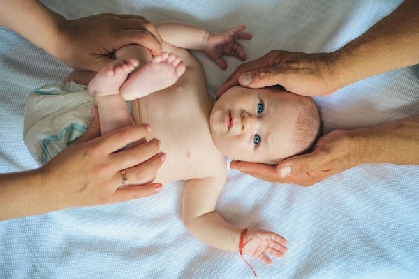 Why do some babies not smile much